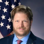 John C. Phillips, LCDR, USN (Ret.)